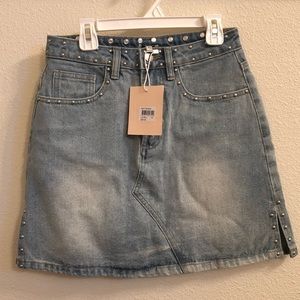 Light blue studded denim mini skirt